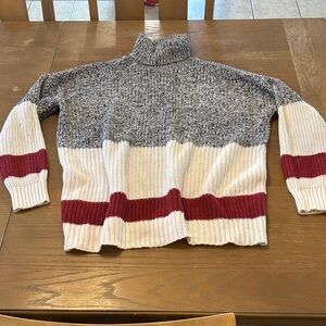 Elegant Gray and White Turtleneck Sweater with Red Accents